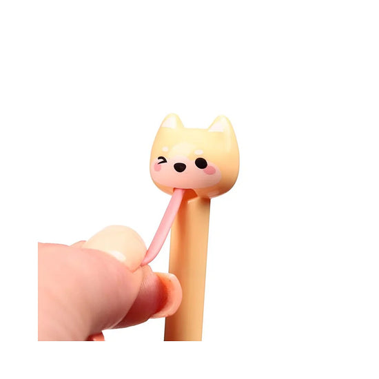  Demonstratie: trek aan de rubberen tong van de Shiba Inu pen om de punt tevoorschijn te laten komen