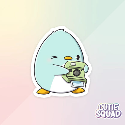 ray penguin sticker van cutiesquad met fototoestel
